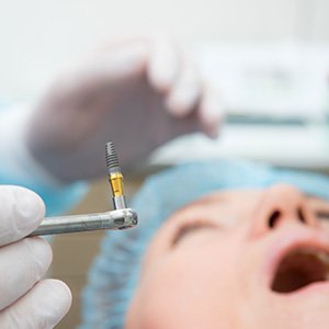 patient getting dental implant 