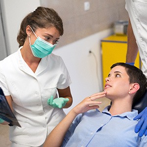 Patient in Kerrville discussing tooth extraction with dentist